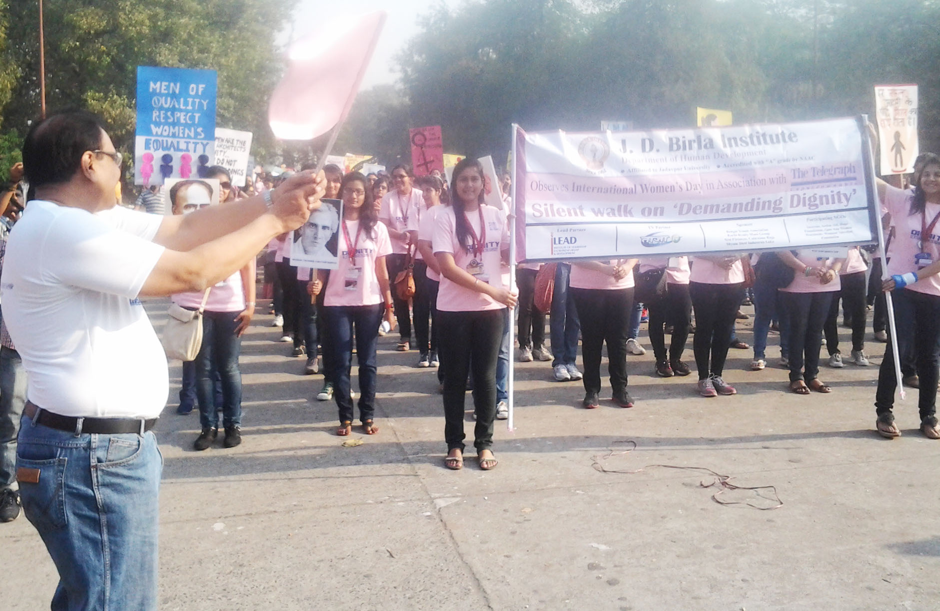 Mr. Pradip Chopra flagging off the Walk on International Women's Day on  Demanding Dignity