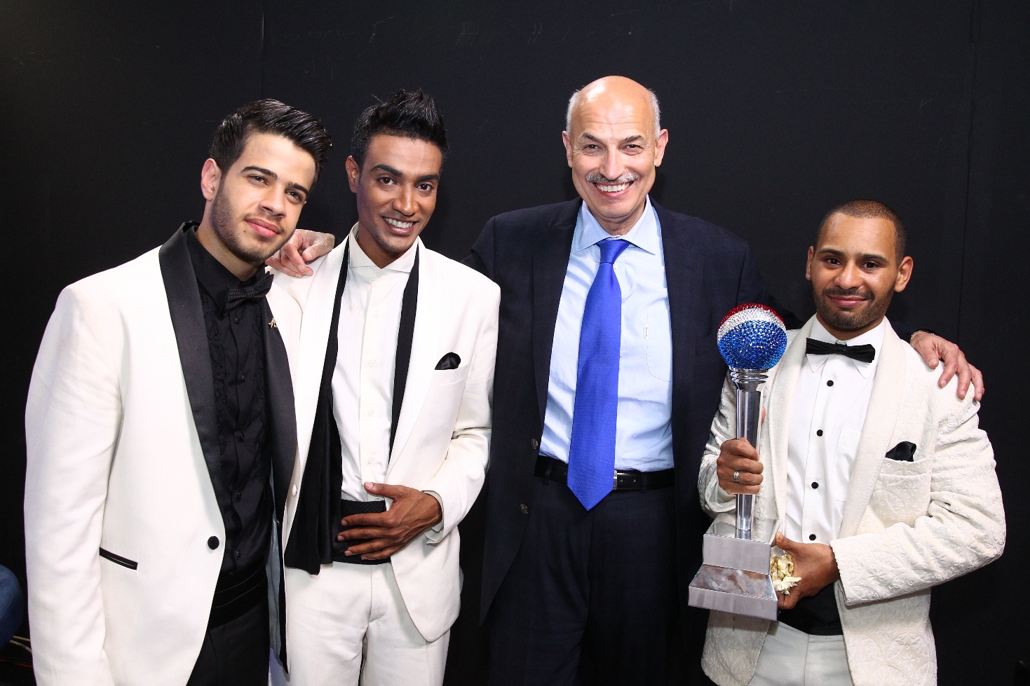 (L-R) Adham Nabulsi  Ibrahim Abdulazim Abouhalka  Saad Abdul-Latif and Mohamed Al Riffi with Trophy