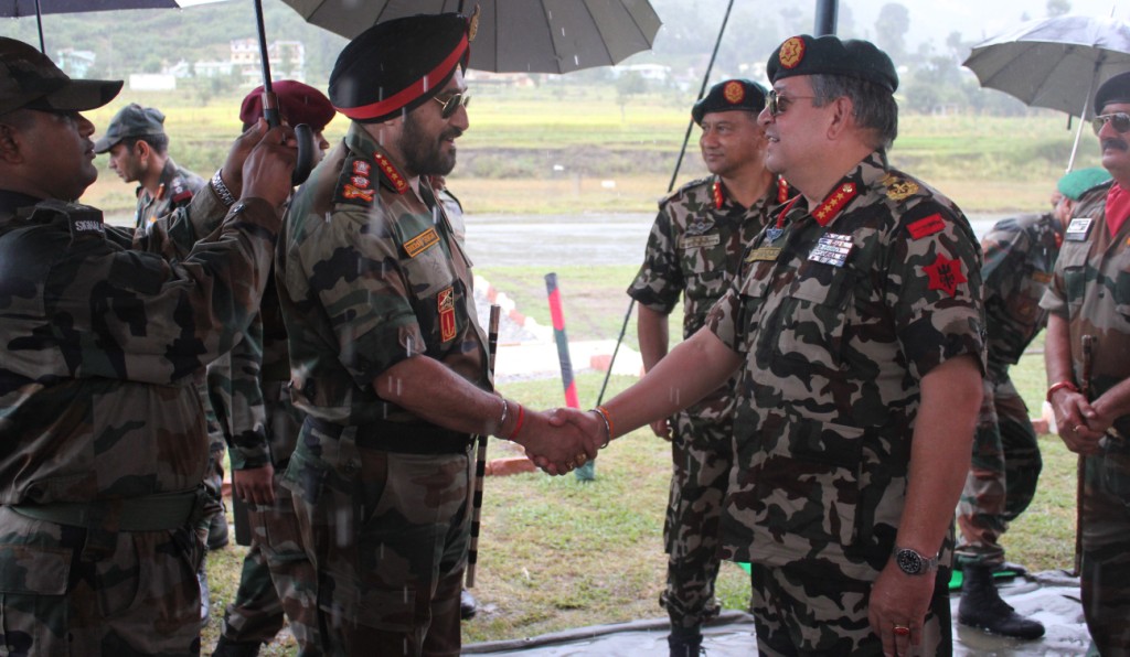 Indian Army Chief General Bikram Singh shaking hand with Nepalese Army Chief General Gaurav Shumsher Jung Bahadur Ran_