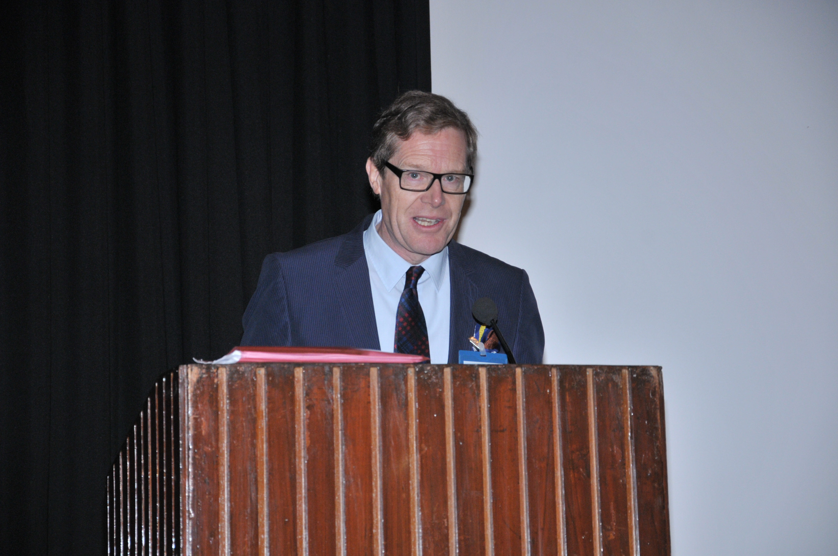 The Ambassador of Switzerland to India  H.E Linus Von Castelmur welcoming the guests at the symposium