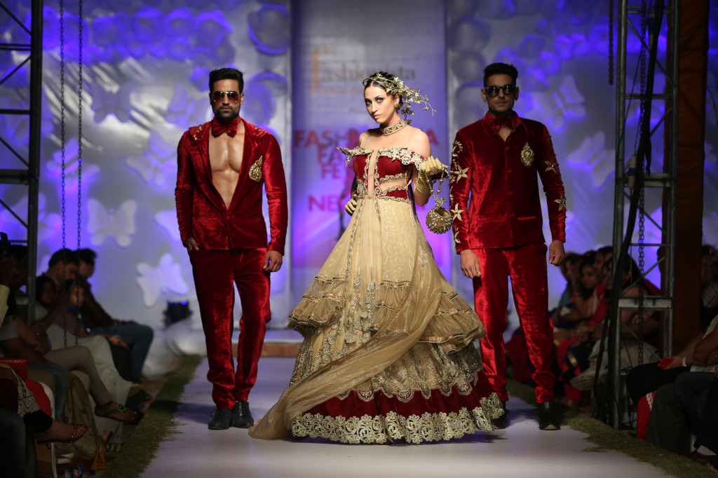 Male and Female models set the ramp on Fire wearing Golden Paradise Theme