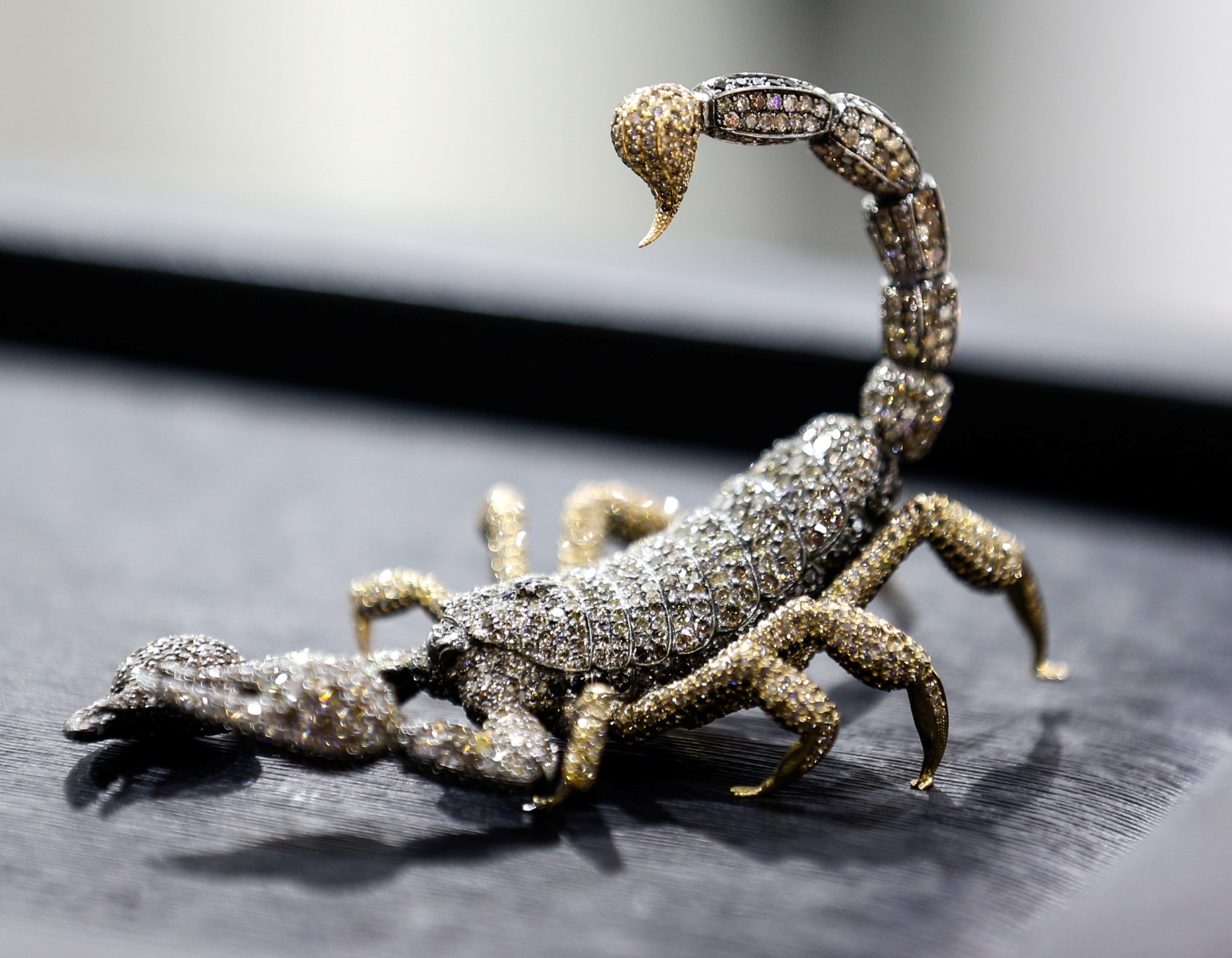 The Scorpion is made from 69 Ct diamonds and contains 3.480 stones. With a base made of 69 Ct gold, the piece is inspired by the designer and his spouse being Scorpios. 