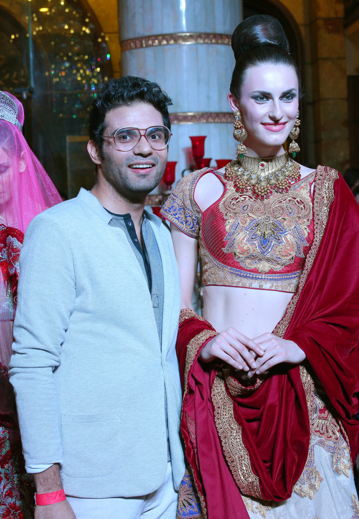 Designer Pankaj Singh with a model