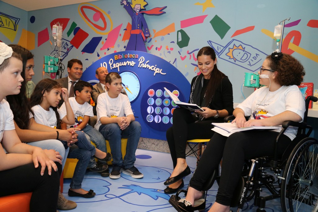 IWC AND ADRIANA LIMA OPEN ?LE PETIT PRINCE? LIBRARY HANDOUT ?  Curitiba, Brazil, 14 April 2015 ? IWC Schaffhausen and brand ambas­sador Adriana Lima inaugurated the new recreation areas and a modern library at the chil­dren?s hospital in Curitiba, Brazil. The extension was made possible by the proceeds from an auction in November 2014, when the sale of an IWC platinum watch raised CHF 40,000. (PHOTOPRESS/IWC)