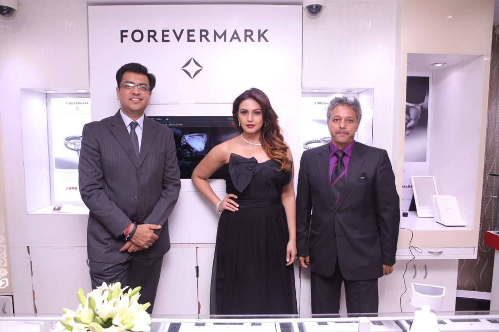 L to R Mr. Sachin Jain  President  Forevermark with actress Huma Qureshi in Forevermark diamonds and Mr. Tinku Singh _