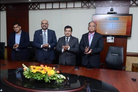 Shri B K Batra and M O Rego, DMDs, Shri S K V Srinivasan, ED and Shri K P Nair, ED at the launch of new Loan Application Processing System
