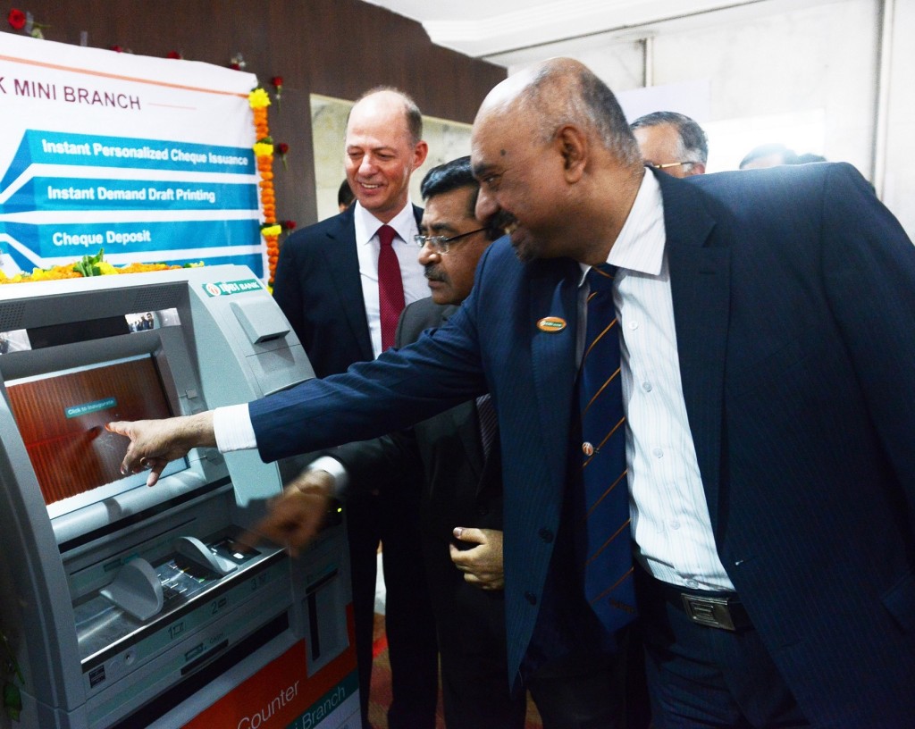DMDs  Shri B K Batra and Shri M O Rego  formally inaugurating the IDBI Bank Mini Branch Kiosk