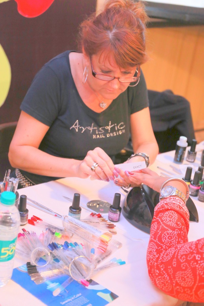 International Nail Artist Lisa Boone giving training on The Artistic Nail Design