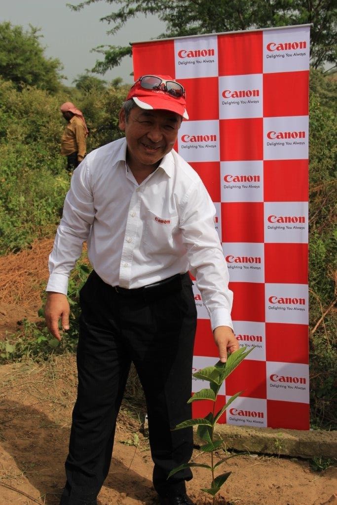 Mr. Kazutada Kobayashi  President & CEO Canon India planting saplings at Aravalli Bio Diversity Park  Gurgaon