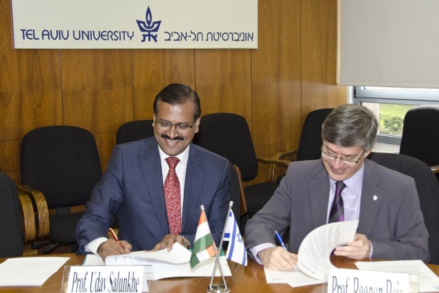 Prof Dr Uday SalunkheGroup DirectorWeSchool signs the MOU with Prof Dr Rannan ReinVice President Tel Aviv University _