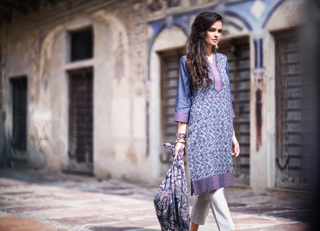 Stylish straight fit kurta with Ikat print front panel made in denim with lace trims by Rangriti