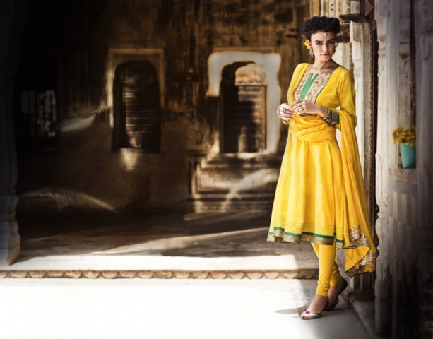 Festive kalidar kurta in Yellow art silk with gota patti on yoke and borders by Rangriti