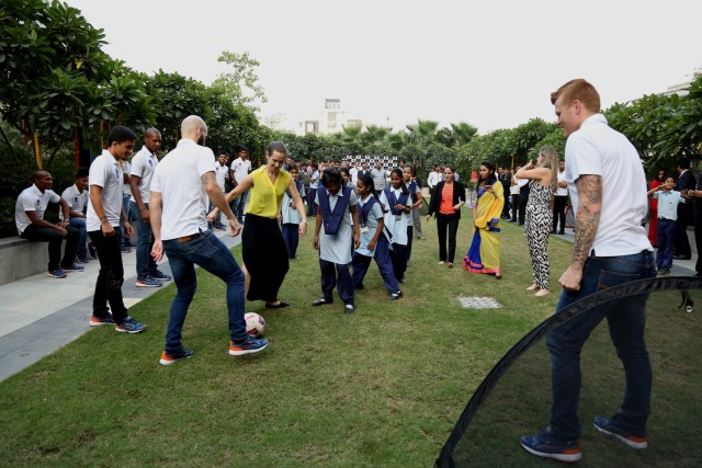 Kempinski Ambience Hotel team and Delhi Dynamos Team playing with kids from Noida Deaf Society