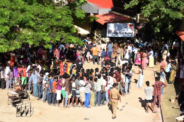 Flood-affected victims collecting the relief materials from World Vision India_