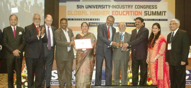 Prof Dr Uday Salunkhe along with WeSchool team recieving the award from Dr Ani_