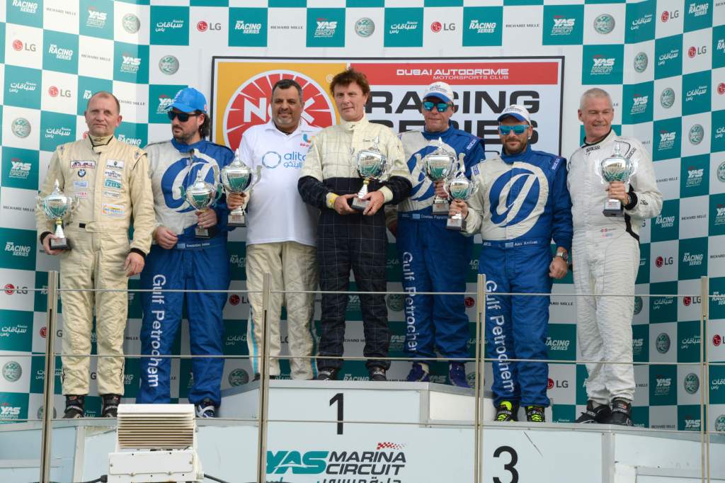 Trophy winners on the Yas Marina Circuit podium after the final race of the NGK Racing Series season