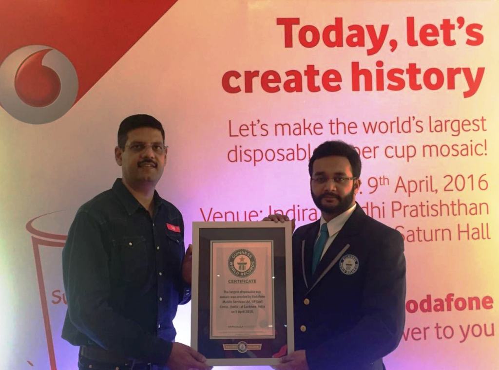 Nipun Sharma  Business Head  UP East  Vodafone receiving the certificate of Guinness World Records for for making the_