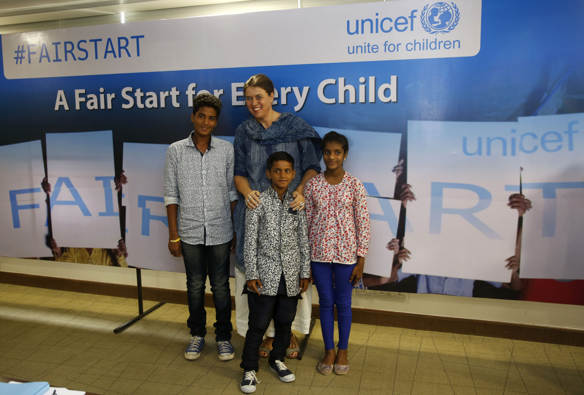 Chief Advocacy and Communication, Unicef India, Caraline Den Dulk, centre, poses with the crew of #FairStart campaign, Cameraman Sahil, left, Art Director Suraj, centre foreground, and Costume organiser Belinda after a press conference in New Delhi, India, Wednesday, May 25, 2016. Photographer/ Mustafa Quraishi
