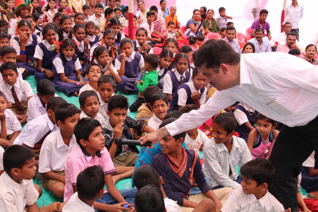 Enthusiastic students participating in a quiz competition at Karanjoti village  Thane  Mumbai