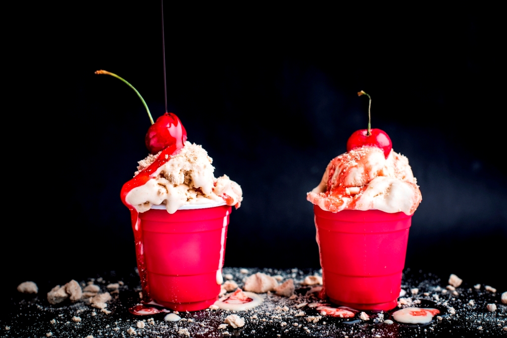 Ice Cream Sundae with crushed coffee meringue and strawberry suace