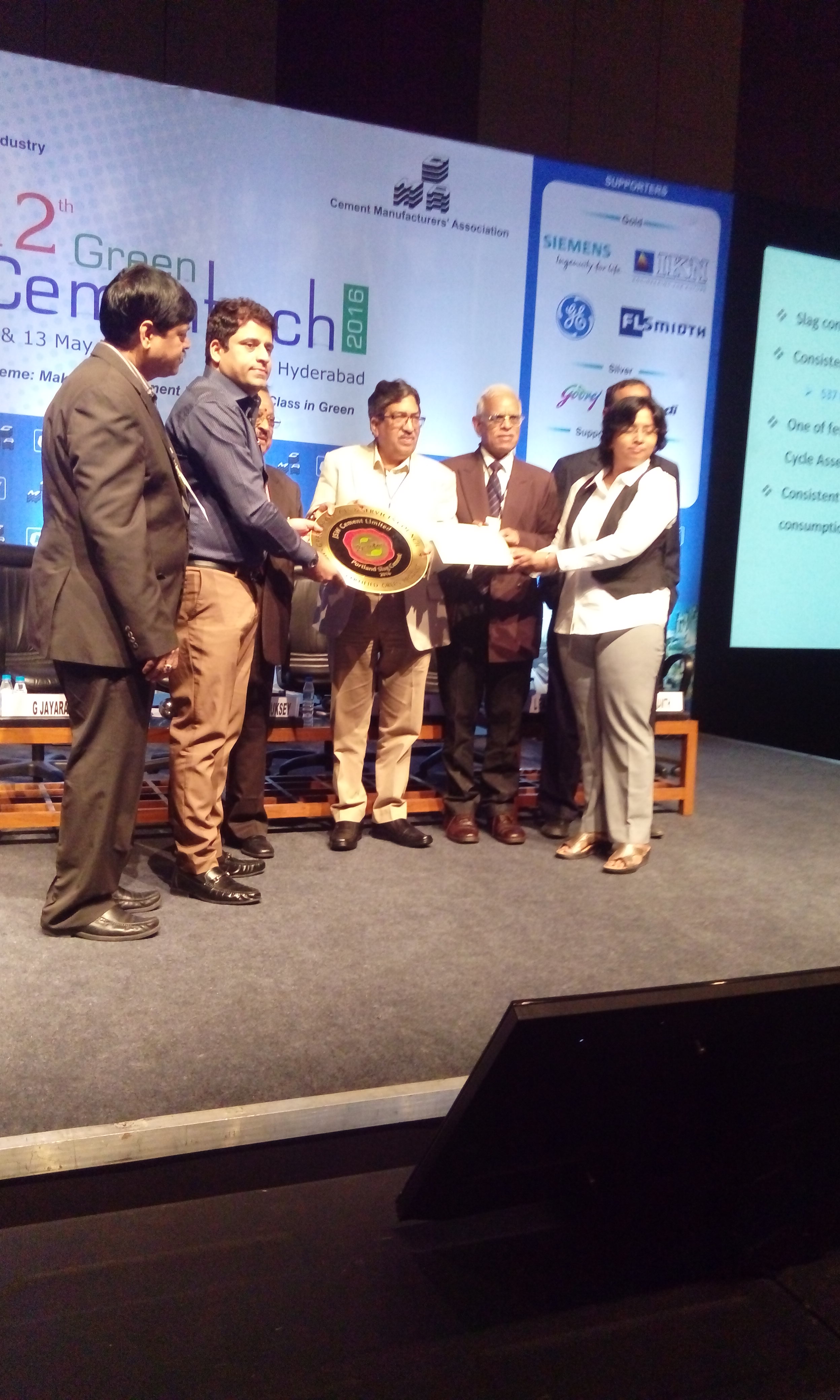 Rahul Akkara Vice President Strategy and Brand receiving the award along with Ms Lopamudra - VP Technical Services at_
