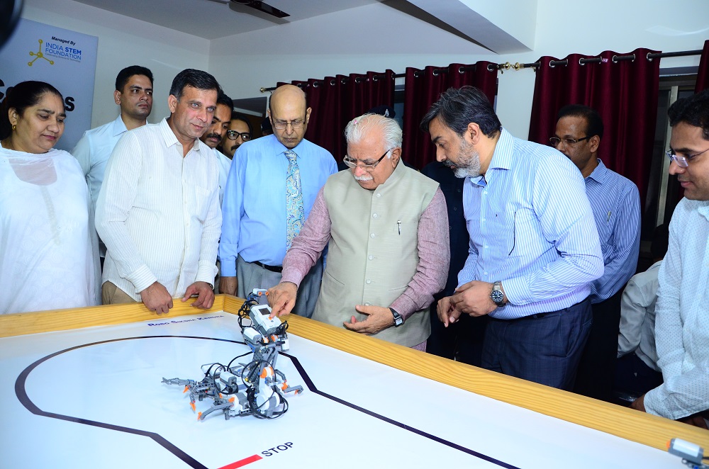 Chief Minister at the DLF Robotics Skill center with the officials of DLF Foun_